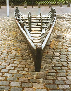 boat sculpture in front of the Hilton Hotel