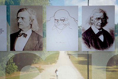 Mommsen images in front of a window to the archaeological park